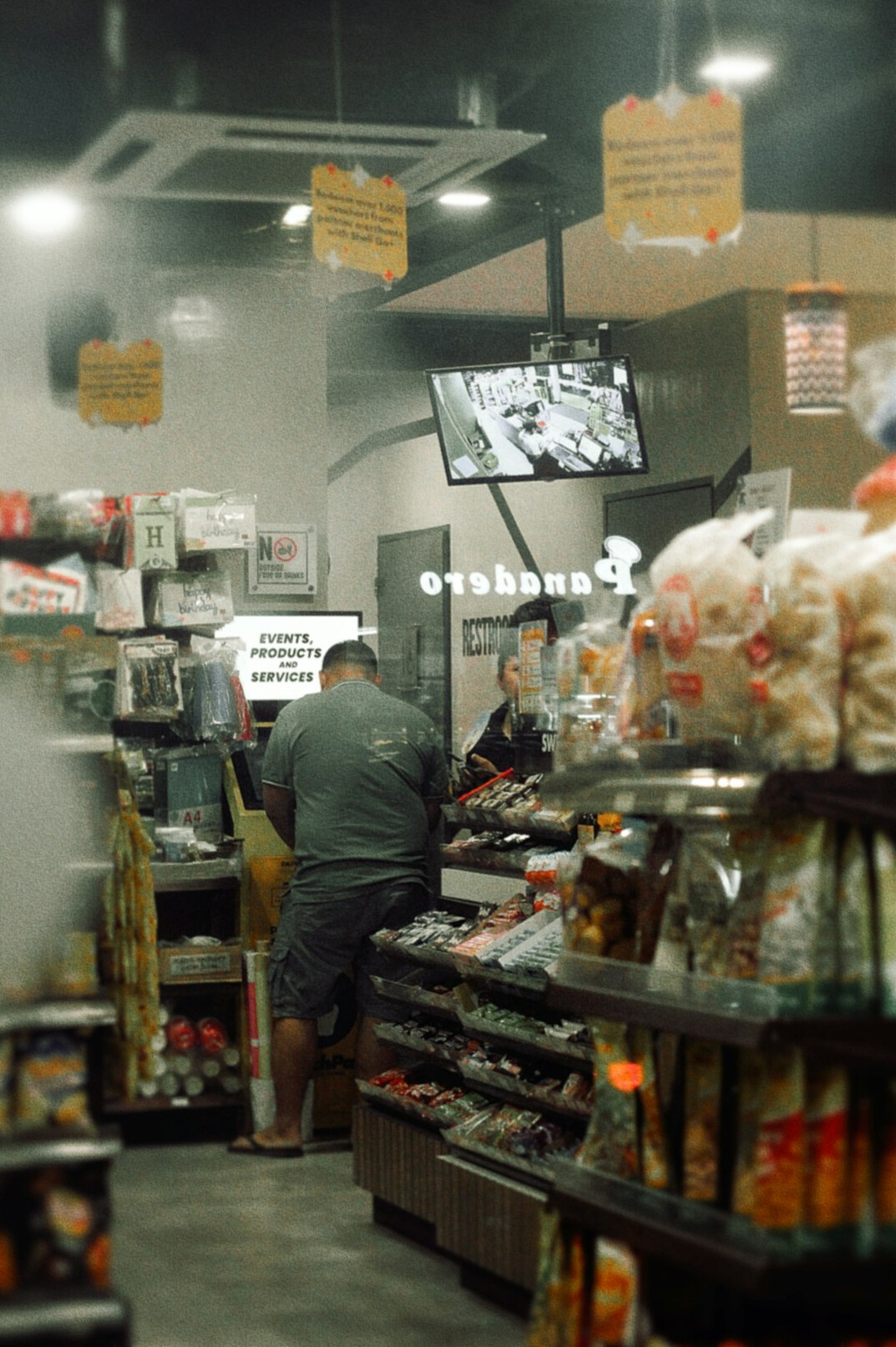 store security guard watching customers