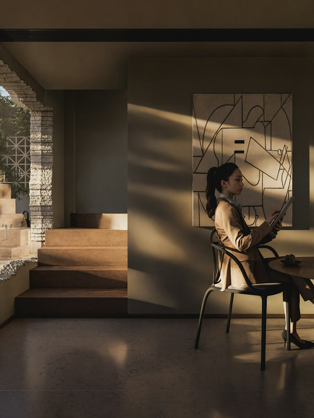 Woman reading on a tablet in a cozy room
